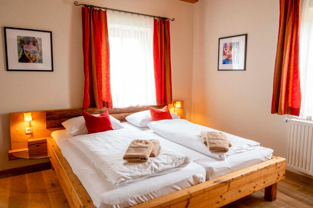 Postel nebo postele na pokoji v ubytování Winzerzimmer Scharl