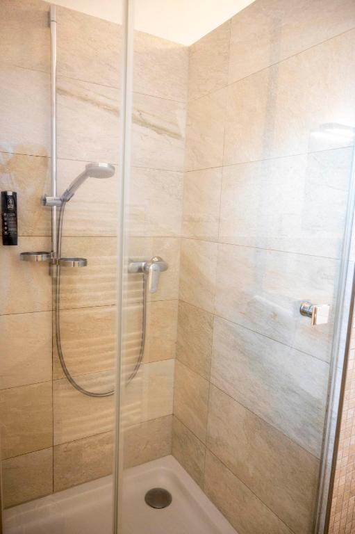 Koupelna v ubytování Winzerzimmer Scharl