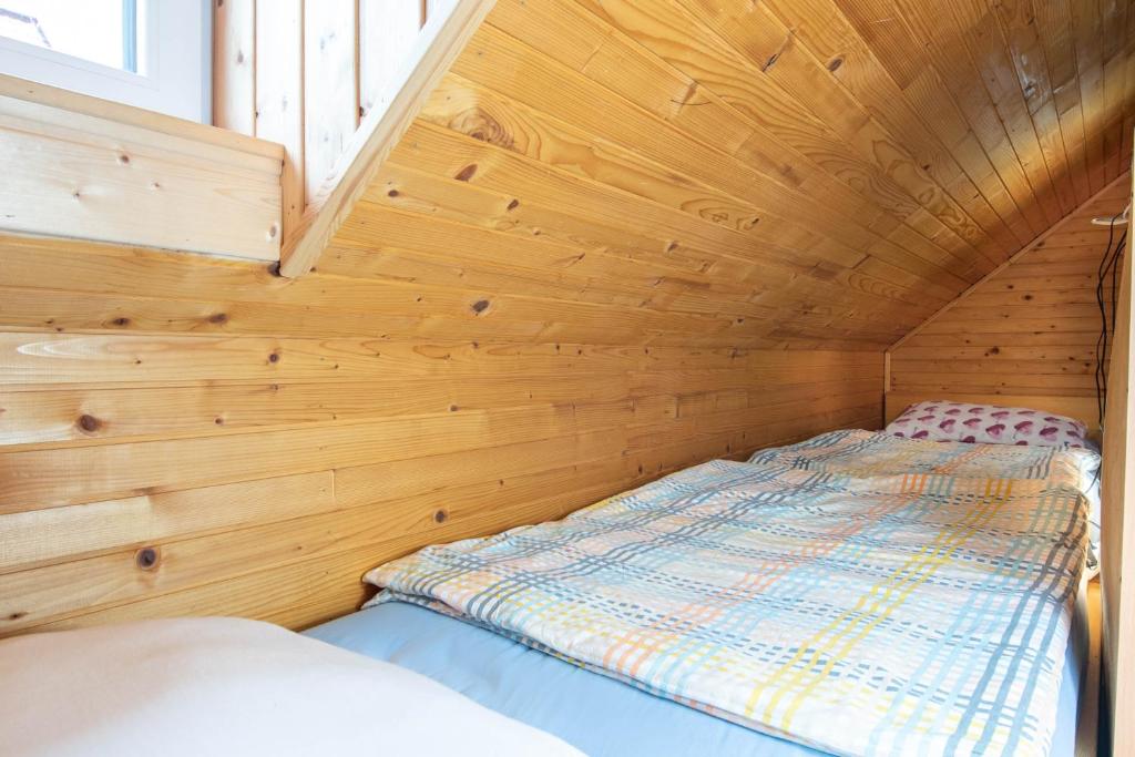Postel nebo postele na pokoji v ubytování Cabin Storzek
