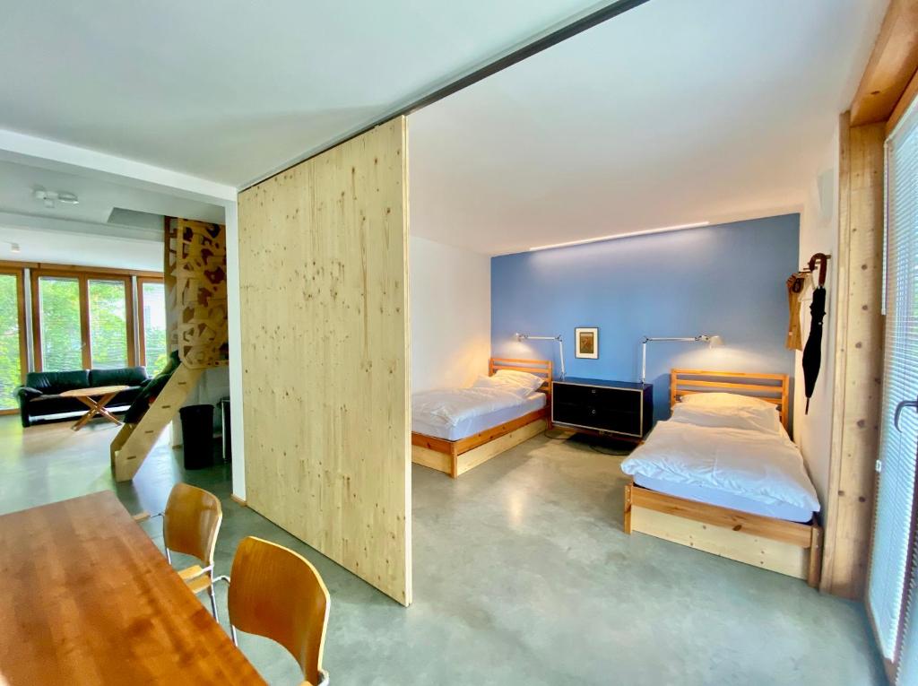 Ένα ή περισσότερα κρεβάτια σε δωμάτιο στο Loft mit Dachterrasse