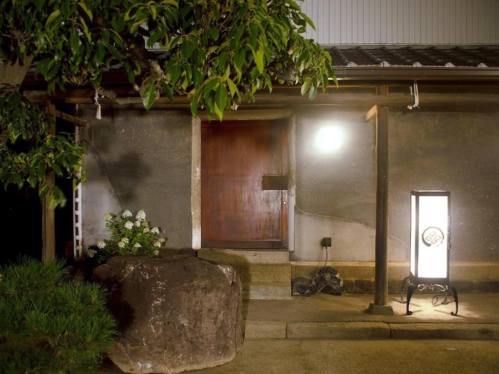 a building with a light on the side of it at gamo house - Vacation STAY 18292v in Sakaide