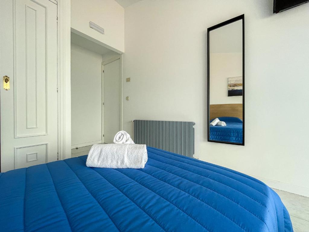 Cama o camas de una habitación en Complejo Tamanaco Illa de Arousa 3000