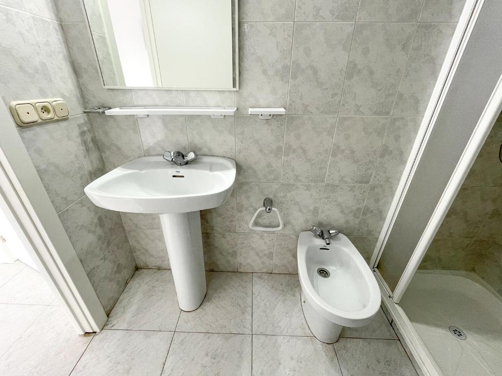 Un baño de Complejo Tamanaco Illa de Arousa 3000