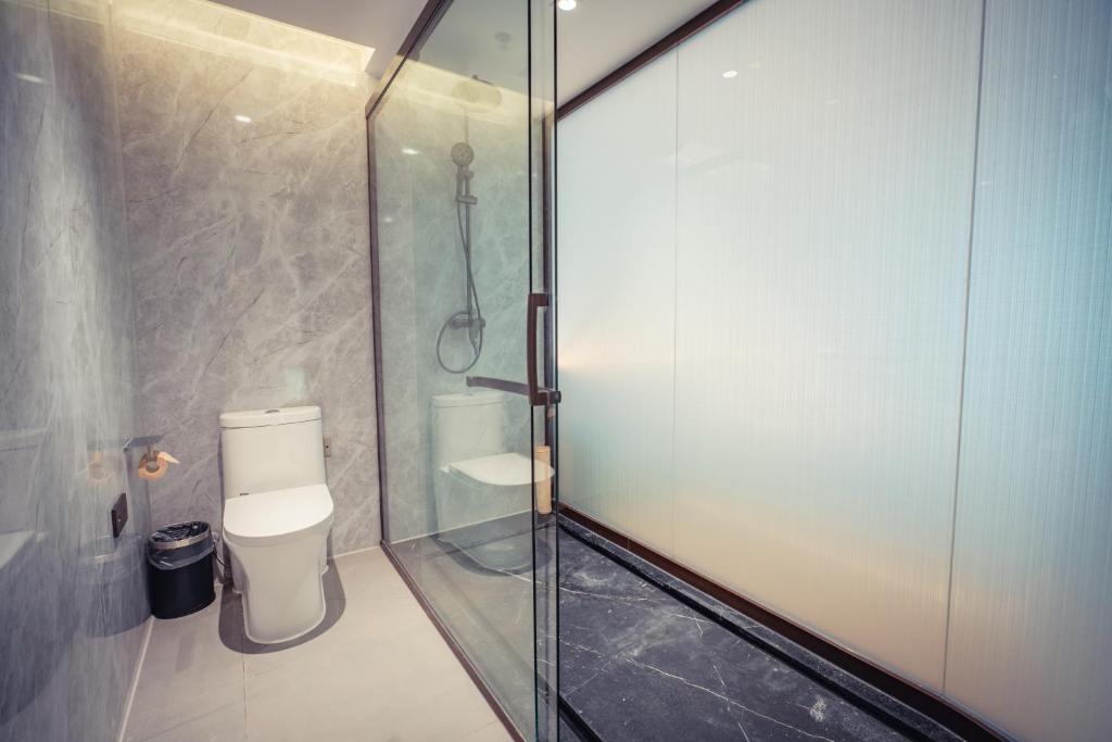 Koupelna v ubytování Yun Qi Hotel