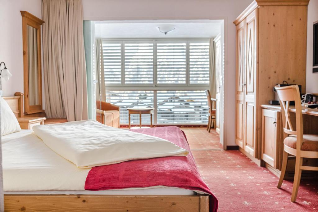 Postel nebo postele na pokoji v ubytování Family Hotel Desirée