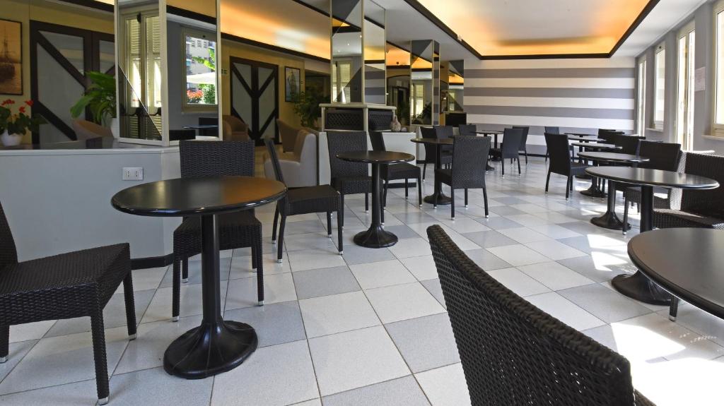 Posezení v ubytování Hotel Sud Est by Fam Rossetti