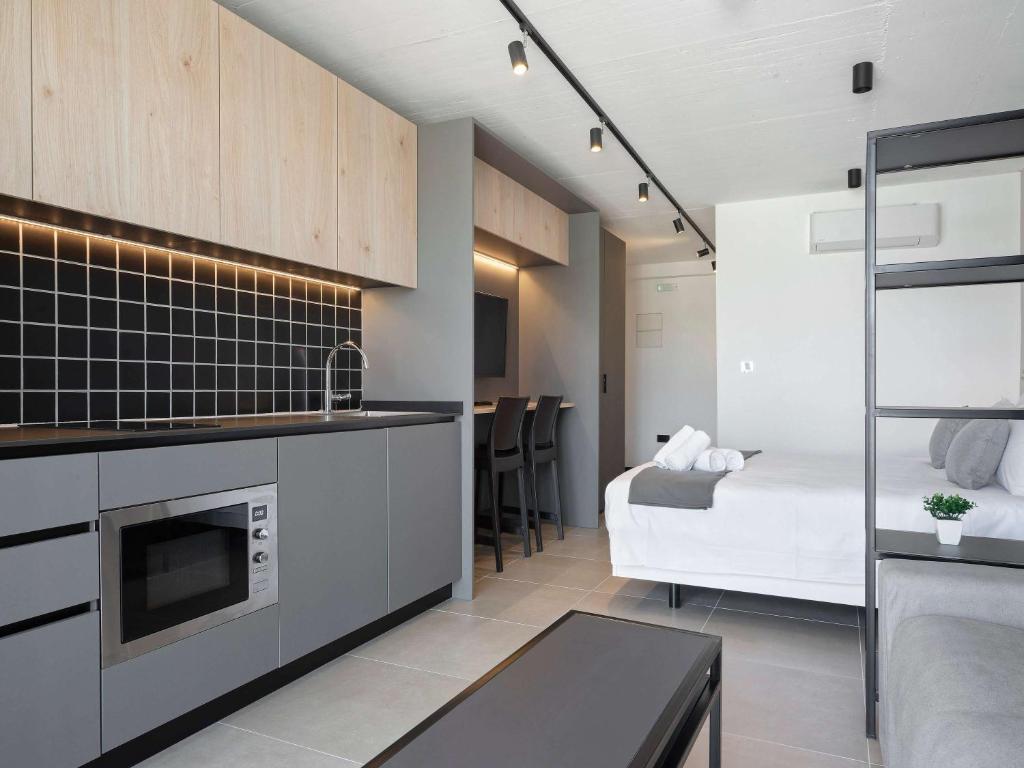 Kuchyň nebo kuchyňský kout v ubytování Aparthotel Adagio Malta Central