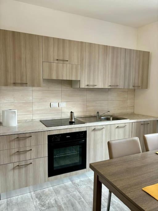 Kuchyň nebo kuchyňský kout v ubytování Loft in Fiera