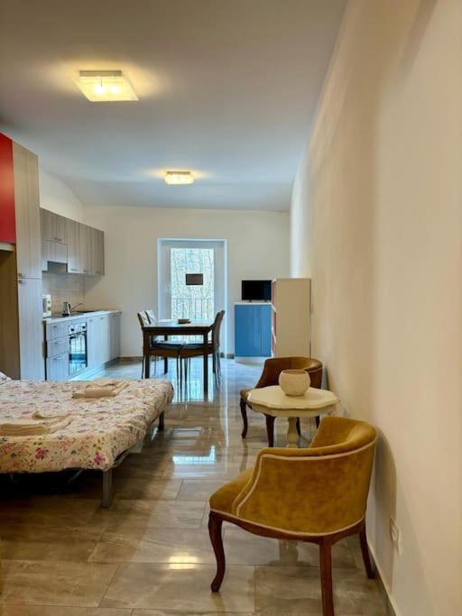 Postel nebo postele na pokoji v ubytování Loft in Fiera