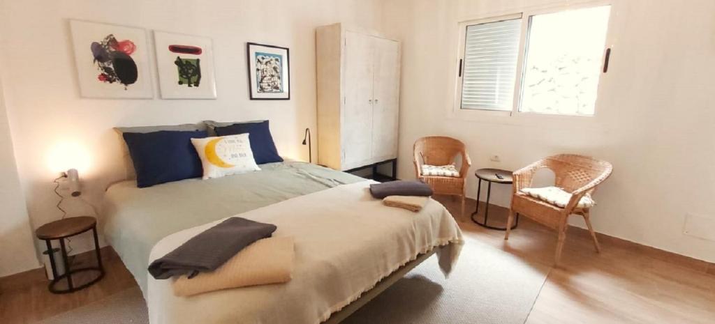 En eller flere senge i et værelse på Casa Alicia Studio 2
