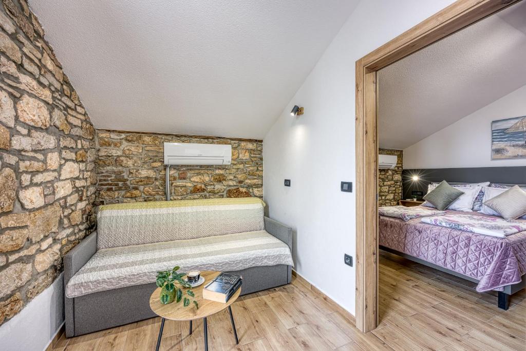 Postel nebo postele na pokoji v ubytování Vila Materada Poreč