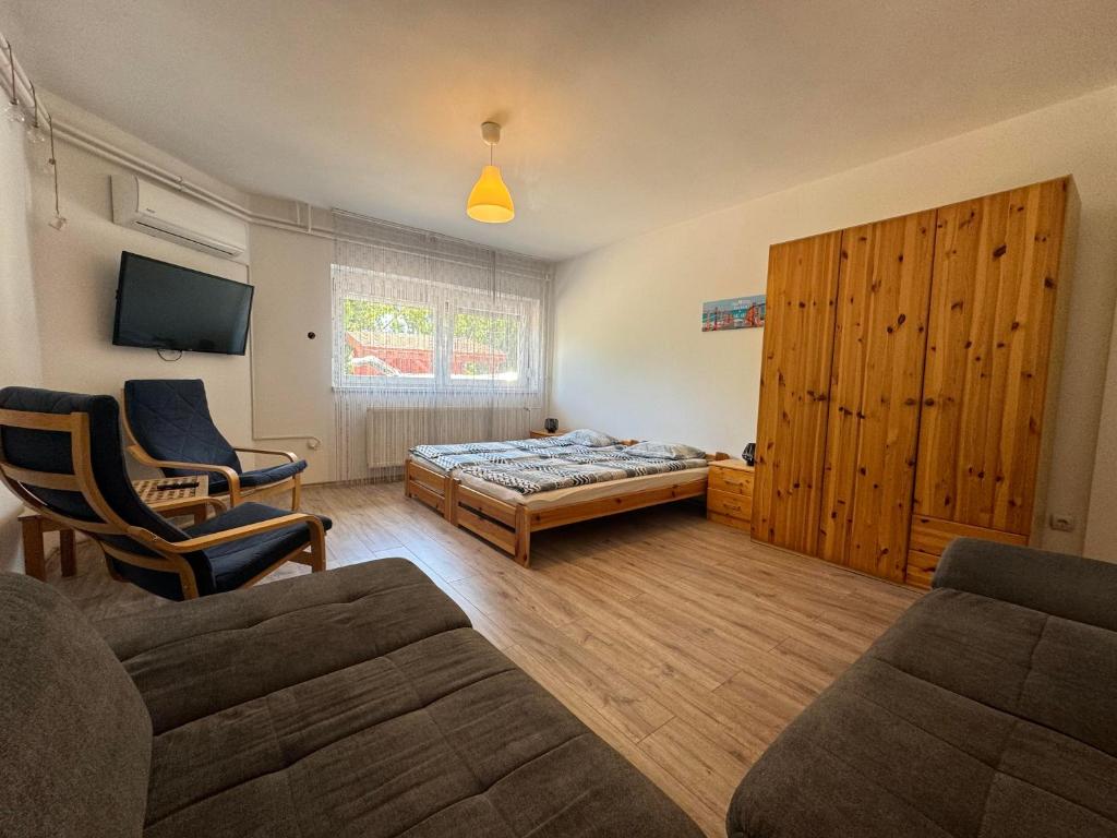 Telewizja i/lub zestaw kina domowego w obiekcie Borsi Apartman