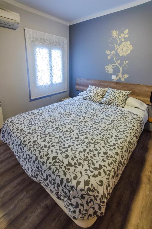 Posteľ alebo postele v izbe v ubytovaní Hostal La Pastora
