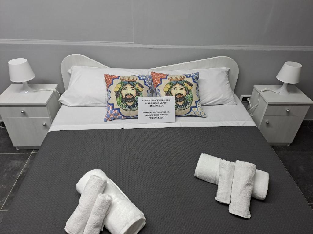 Krevet ili kreveti u jedinici u objektu Esmeralda Il Quadrifoglio Airport Fontanarossa