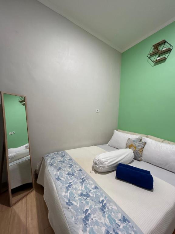 Postel nebo postele na pokoji v ubytování Clamitan House