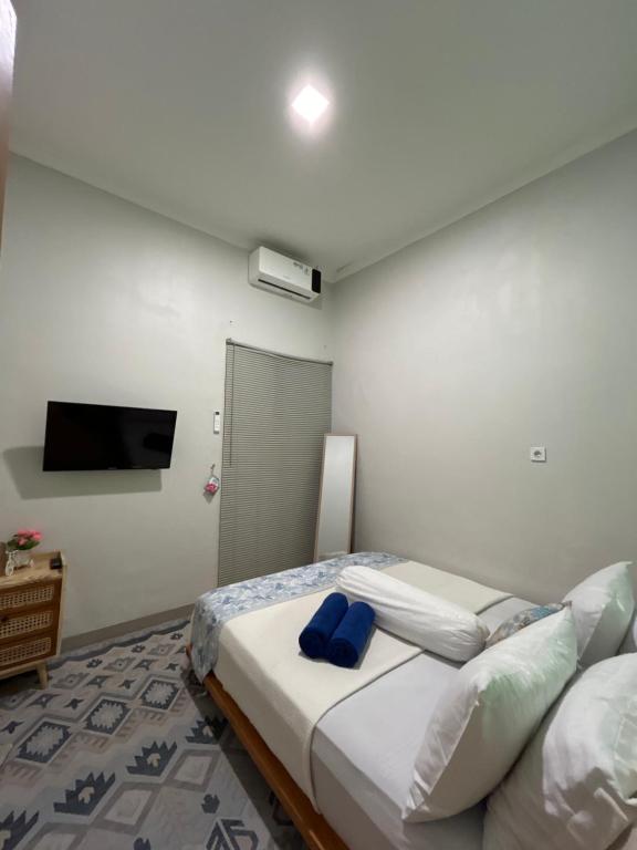 Postel nebo postele na pokoji v ubytování Clamitan House