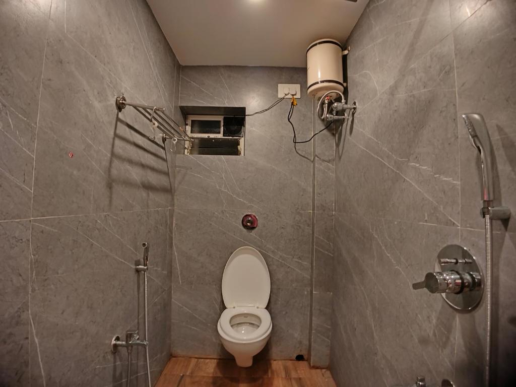 Koupelna v ubytování HOTEL RINKY'S PALACE