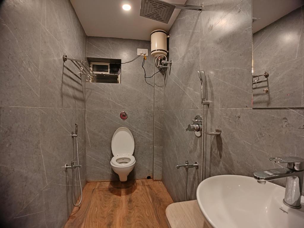 Koupelna v ubytování HOTEL RINKY'S PALACE