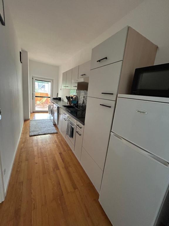 Kuchyň nebo kuchyňský kout v ubytování Apartment Bambi