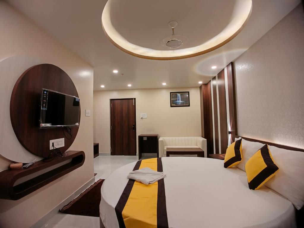 TV a/nebo společenská místnost v ubytování HOTEL RINKY'S PALACE
