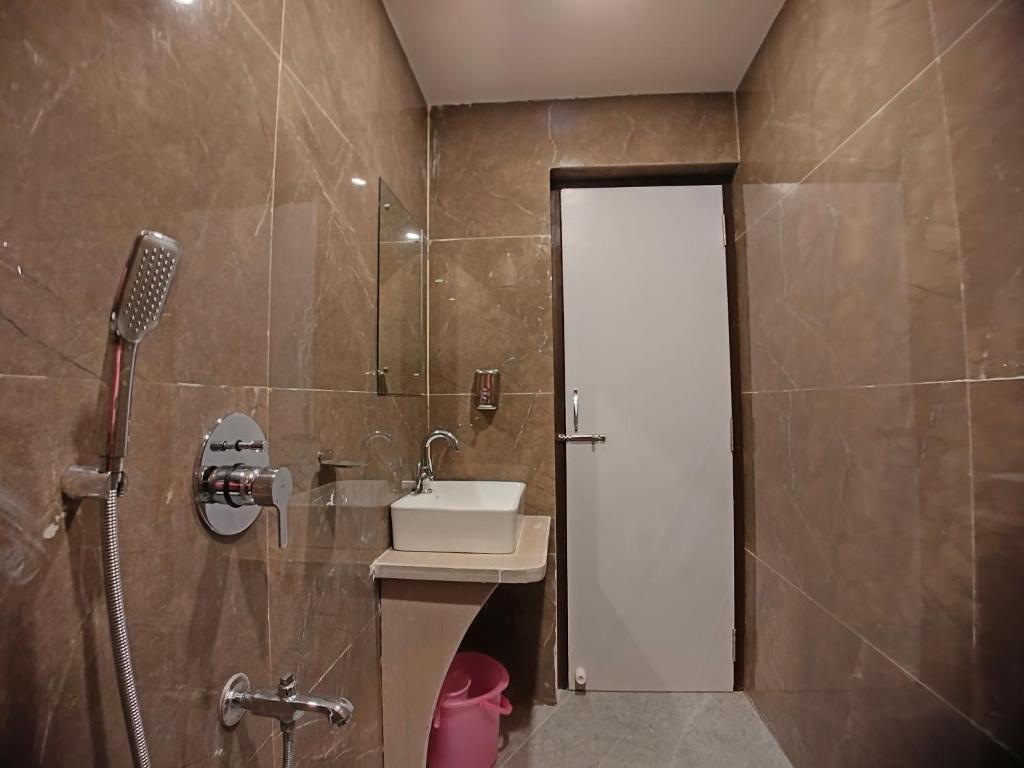 Koupelna v ubytování HOTEL RINKY'S PALACE