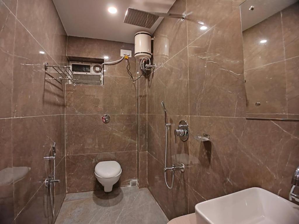 Koupelna v ubytování HOTEL RINKY'S PALACE