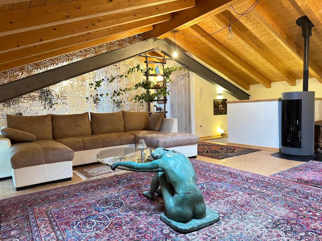 Posezení v ubytování Residence Belvedere Barcis Mansarde
