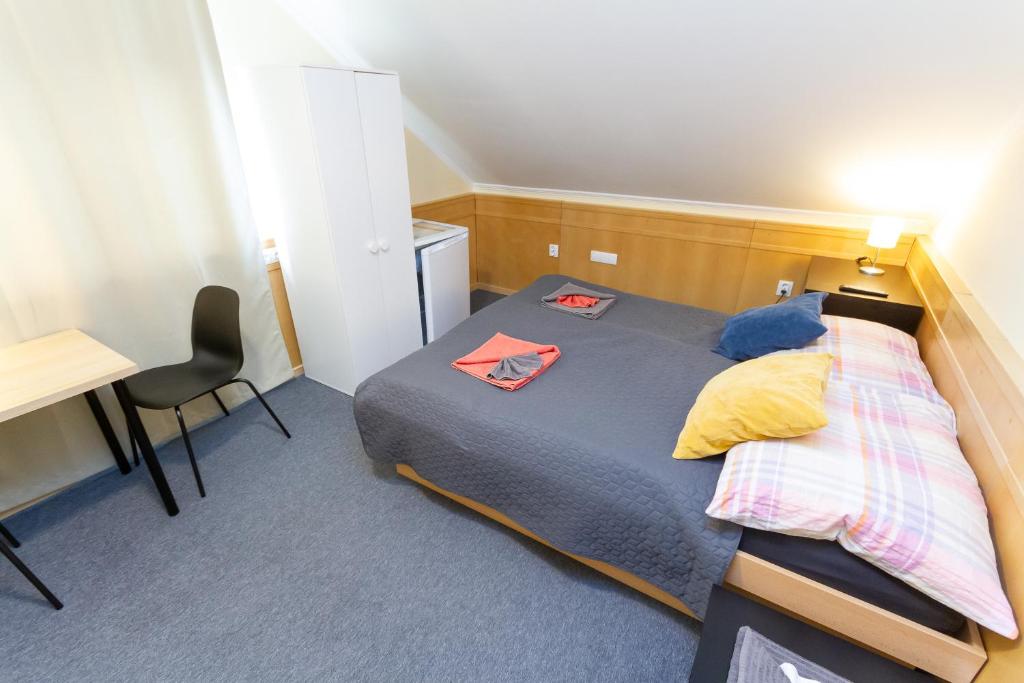 Postel nebo postele na pokoji v ubytování Kati P Vendégház