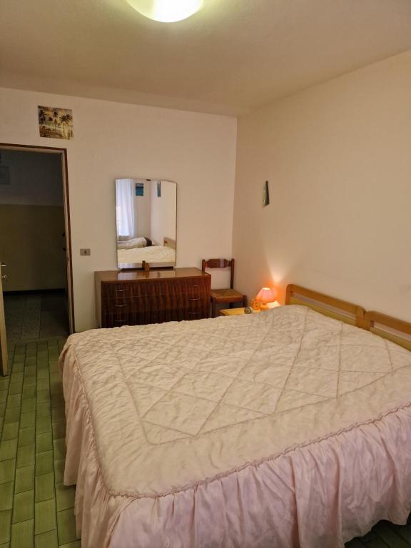 Postel nebo postele na pokoji v ubytování Albergo Ristorante "Al Sole"