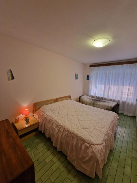 Postel nebo postele na pokoji v ubytování Albergo Ristorante "Al Sole"