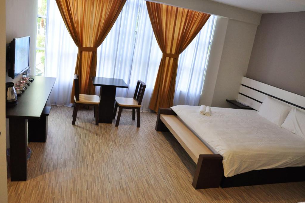 Katil atau katil-katil dalam bilik di Grand Kapar Hotel Kuala Selangor