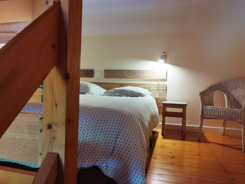 Postel nebo postele na pokoji v ubytování Le Grand Gîte