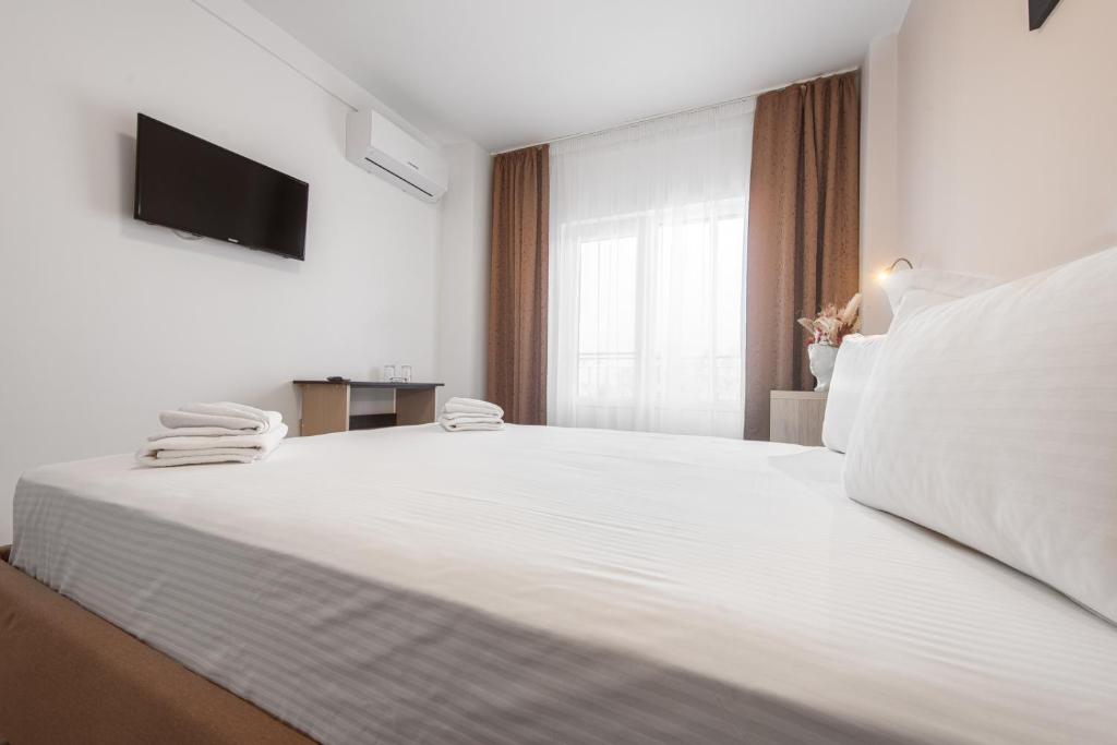 Postel nebo postele na pokoji v ubytování Casa Polux