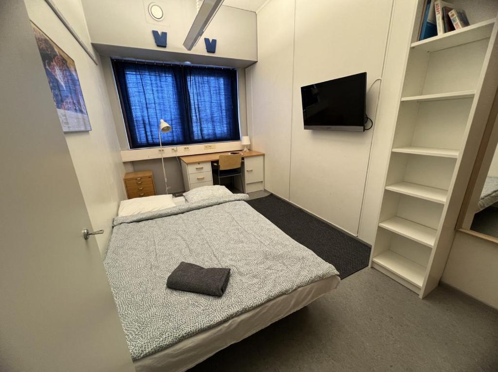 TV a/nebo společenská místnost v ubytování Office House Services 207