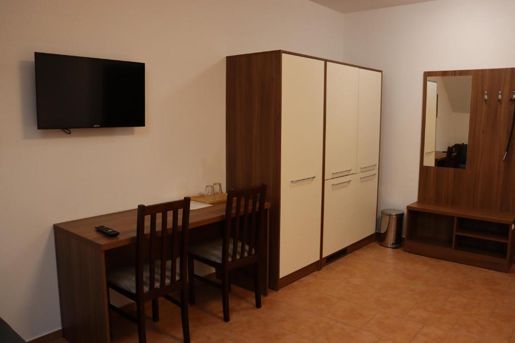 TV a/nebo společenská místnost v ubytování Pension Restaurace Florián
