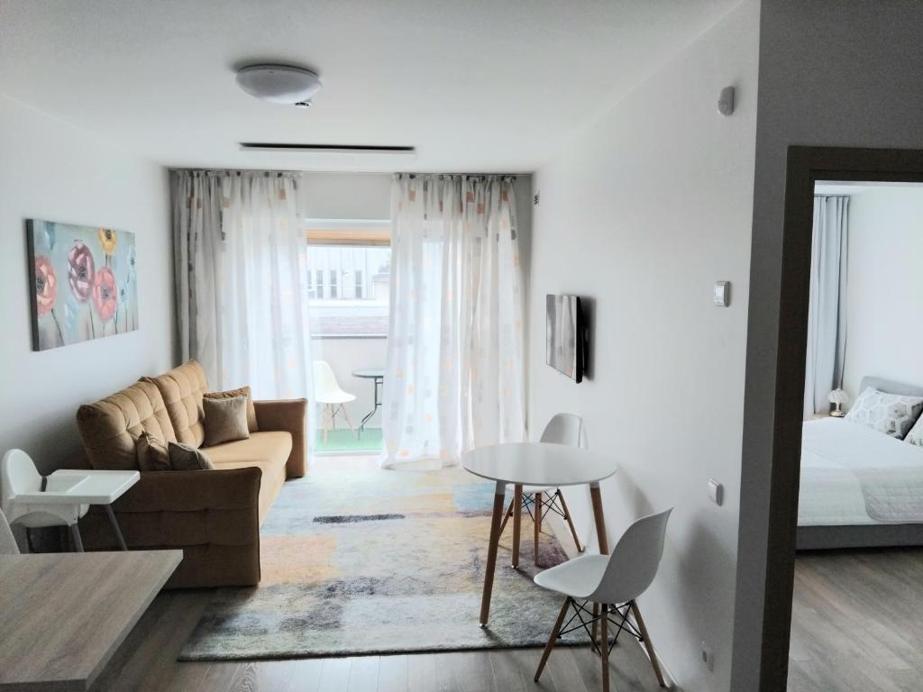 Et opholdsområde på Vidmantės apartamentai