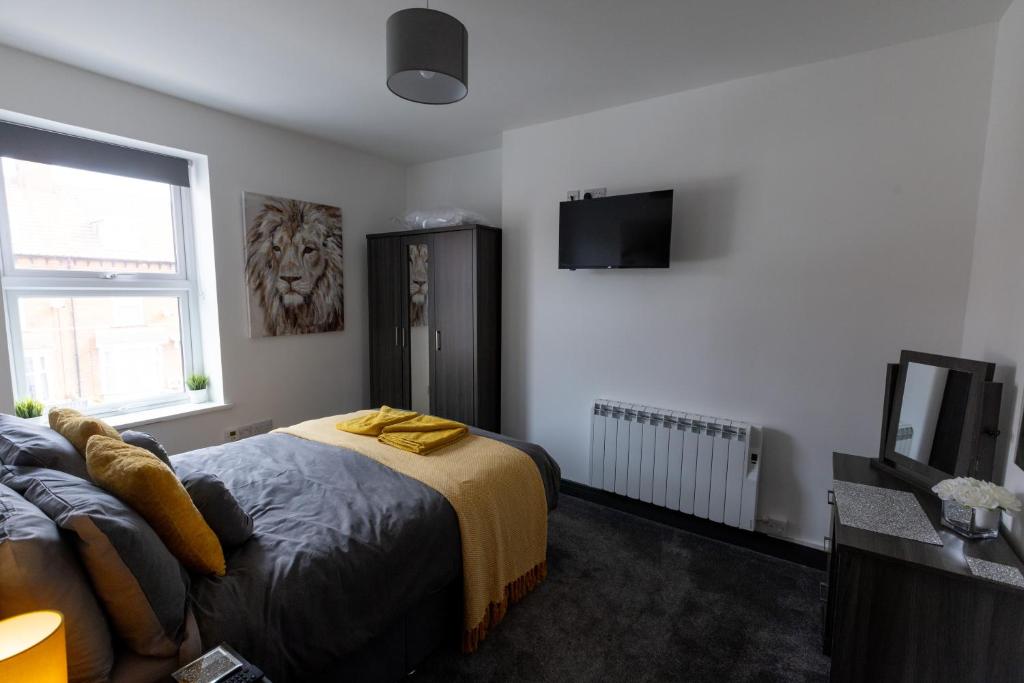 Postel nebo postele na pokoji v ubytování Victoria Apartments