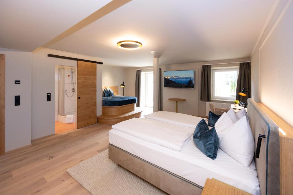 Postel nebo postele na pokoji v ubytování Hotel Zum Mohren