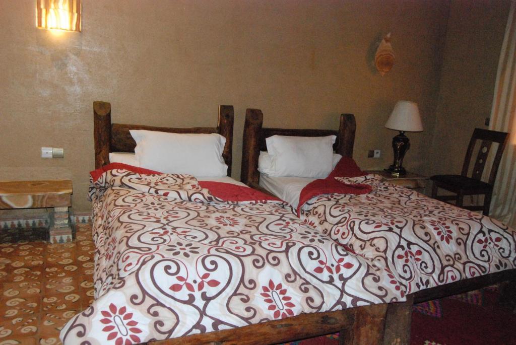 Postel nebo postele na pokoji v ubytování Hotel Taddart