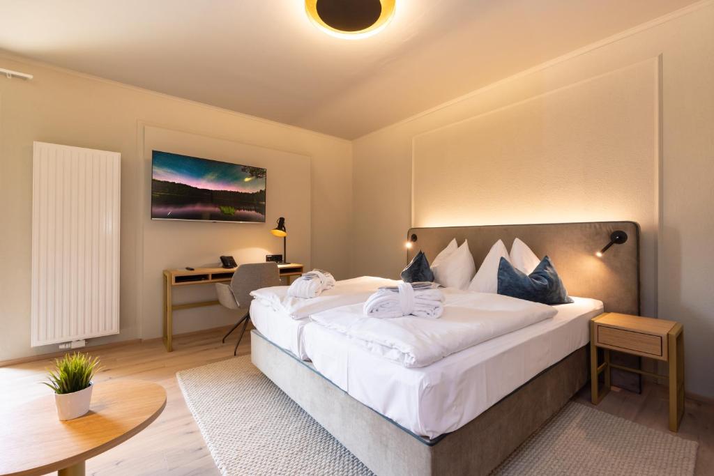 Postel nebo postele na pokoji v ubytování Hotel Zum Mohren