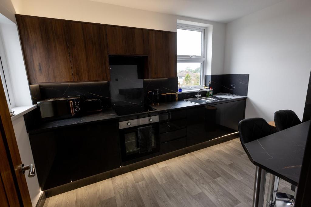 Kuchyň nebo kuchyňský kout v ubytování Victoria Apartments