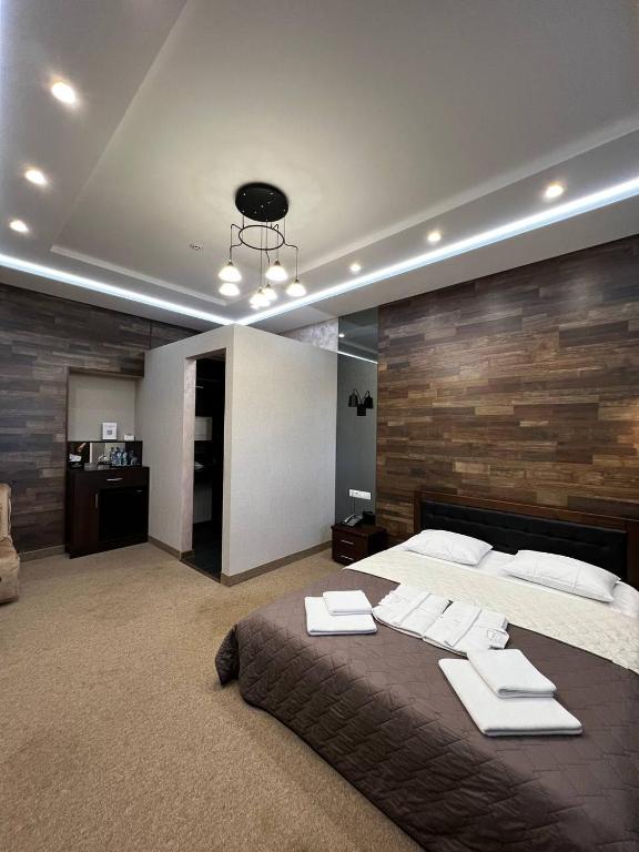 Postel nebo postele na pokoji v ubytování Levanevsky Hotel