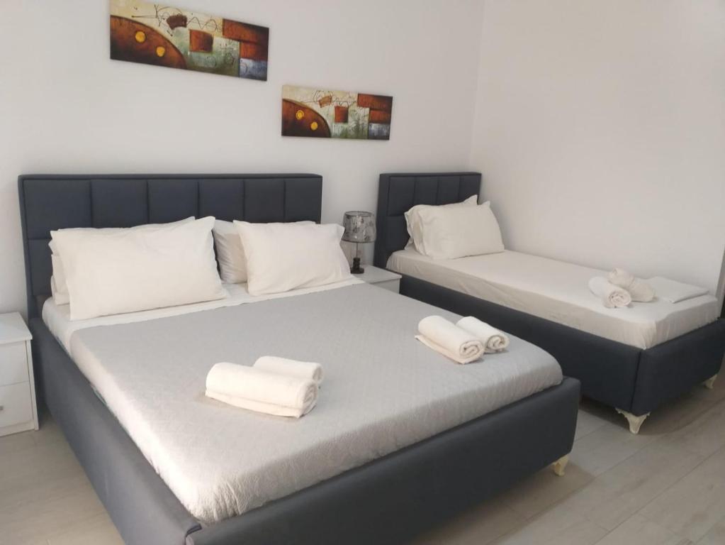 Postel nebo postele na pokoji v ubytování Deka-X Rooms