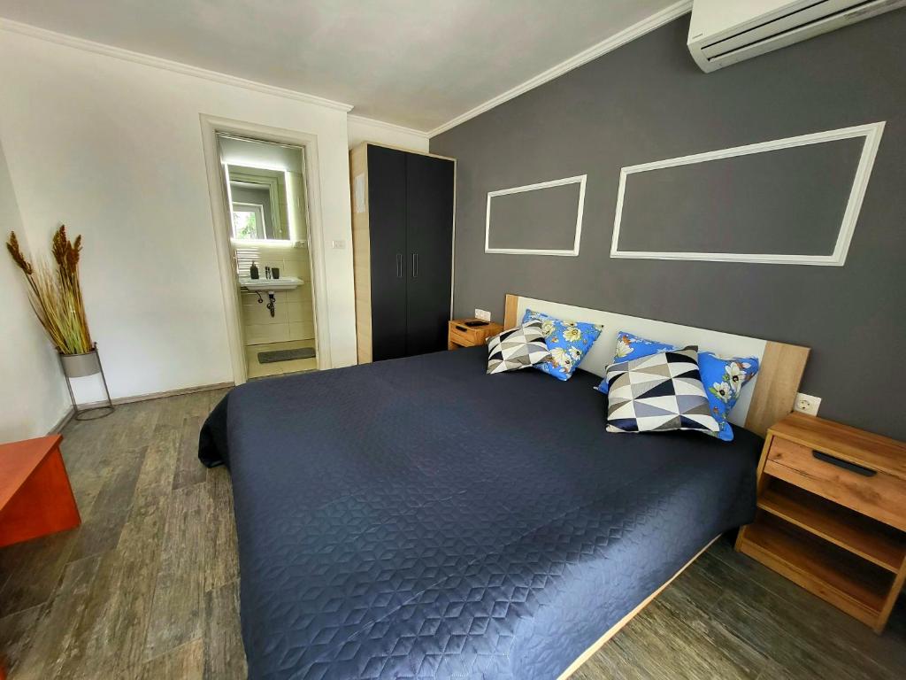 Postel nebo postele na pokoji v ubytování Vila Materada Poreč