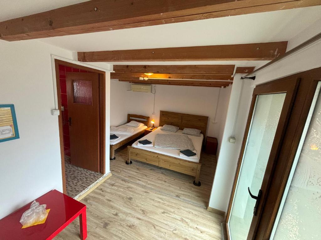 Postel nebo postele na pokoji v ubytování Bazart Vama Veche