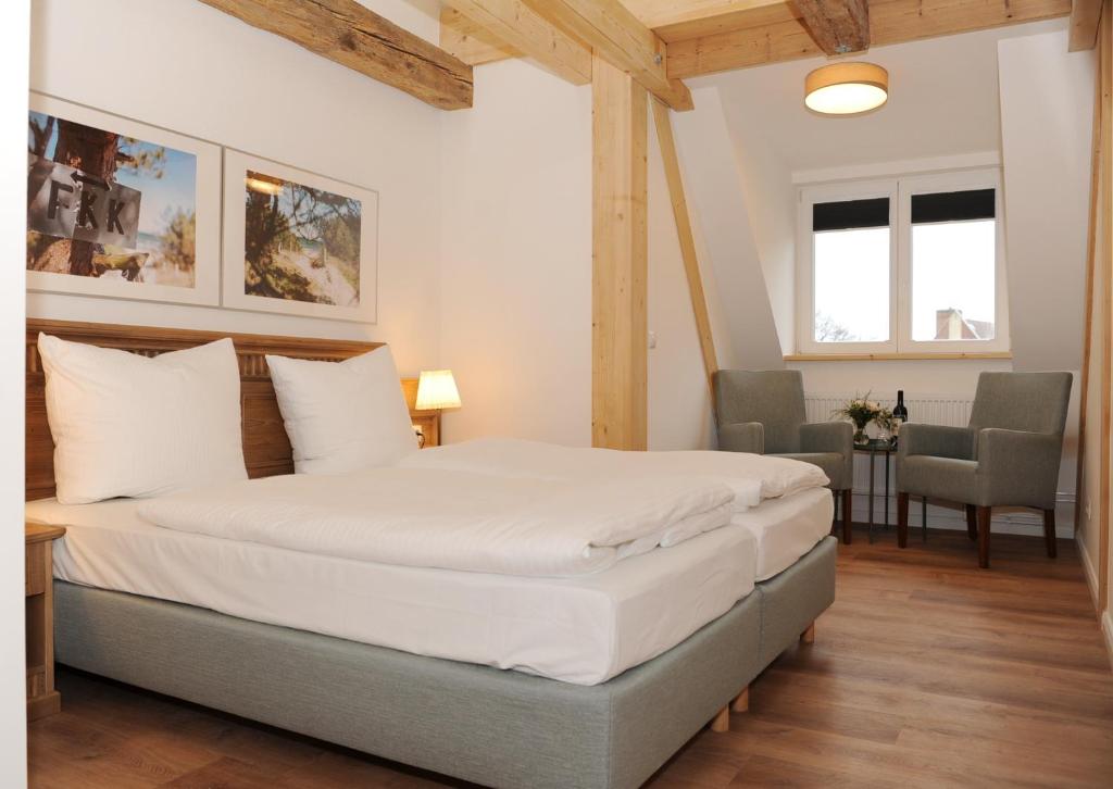 Een bed of bedden in een kamer bij Aparthotel an Sankt Marien
