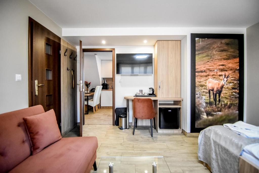 Kuchyňa alebo kuchynka v ubytovaní Apartamenty Mrozówka