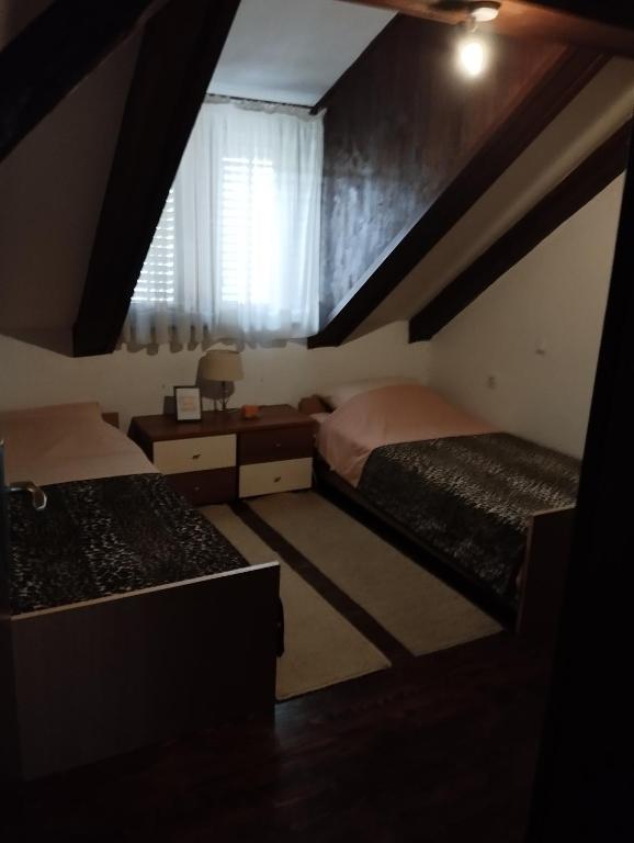 Postel nebo postele na pokoji v ubytování Jasna1