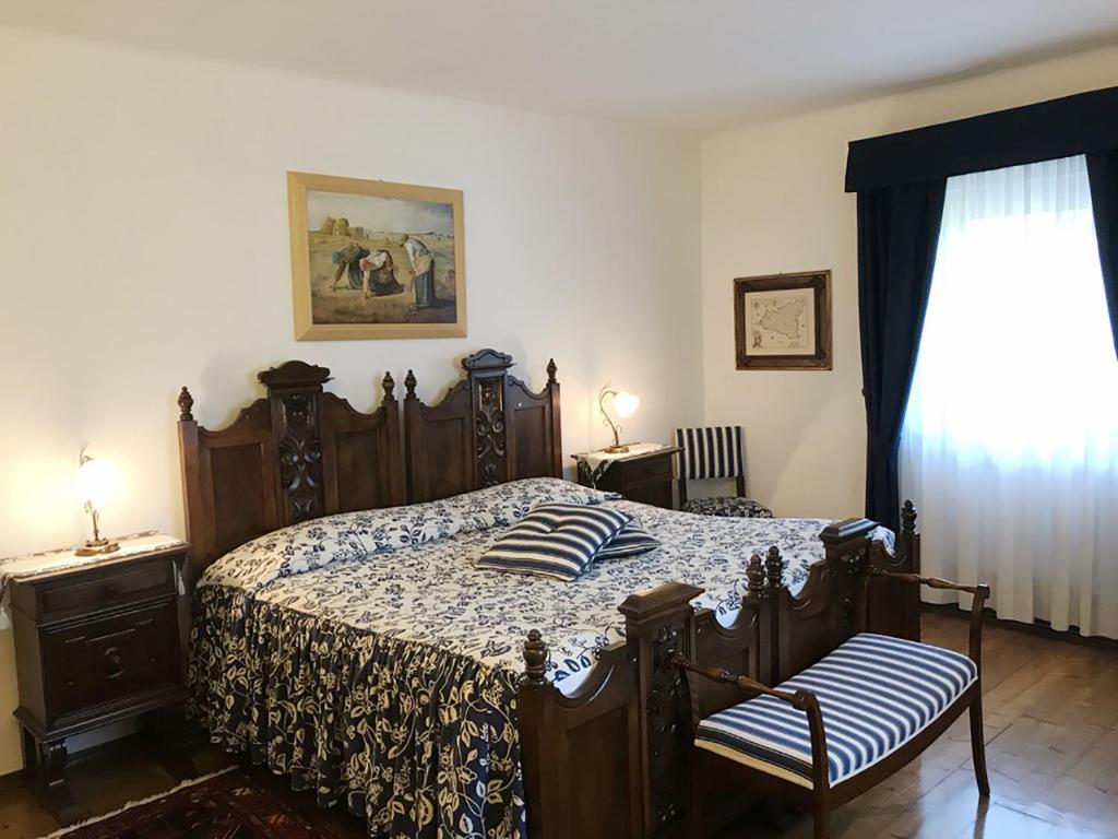 Postel nebo postele na pokoji v ubytování Casa Due Tigli B&B