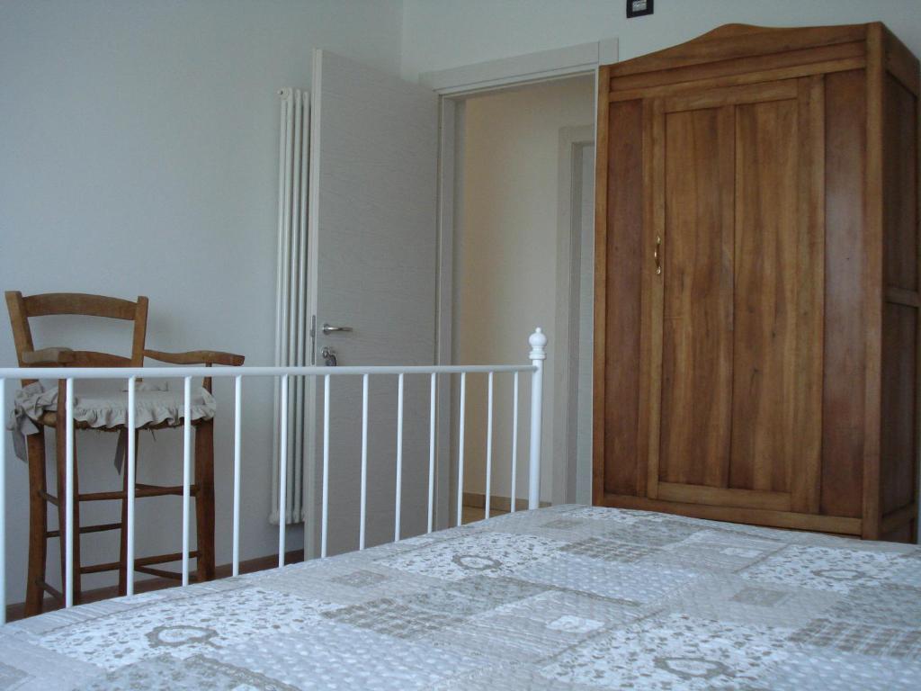 Postel nebo postele na pokoji v ubytování Ai Pianai